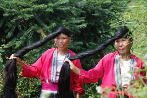 The Yao women credit the length and color of their hair to the fact they bathe it in rice water